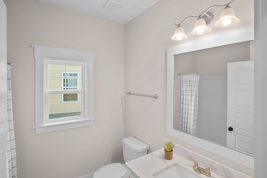 Furnished interior view inside a new home in The Sanctuary at Sunset Beach, Sunset Beach (Image 39).