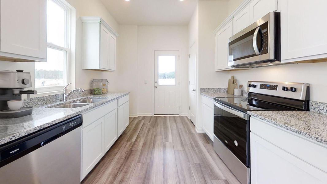 Furnished interior view inside a new home in Crossing at Givhans, Ridgeville (Image 4).