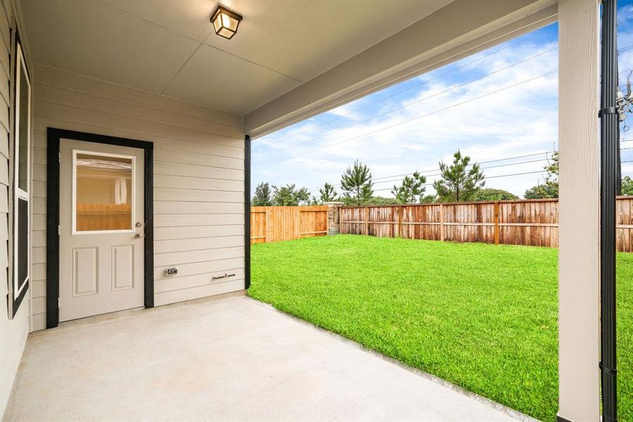 Covered Patio. Sample photo of completed home with similar floor plan. As-built interior colors and selections may vary.