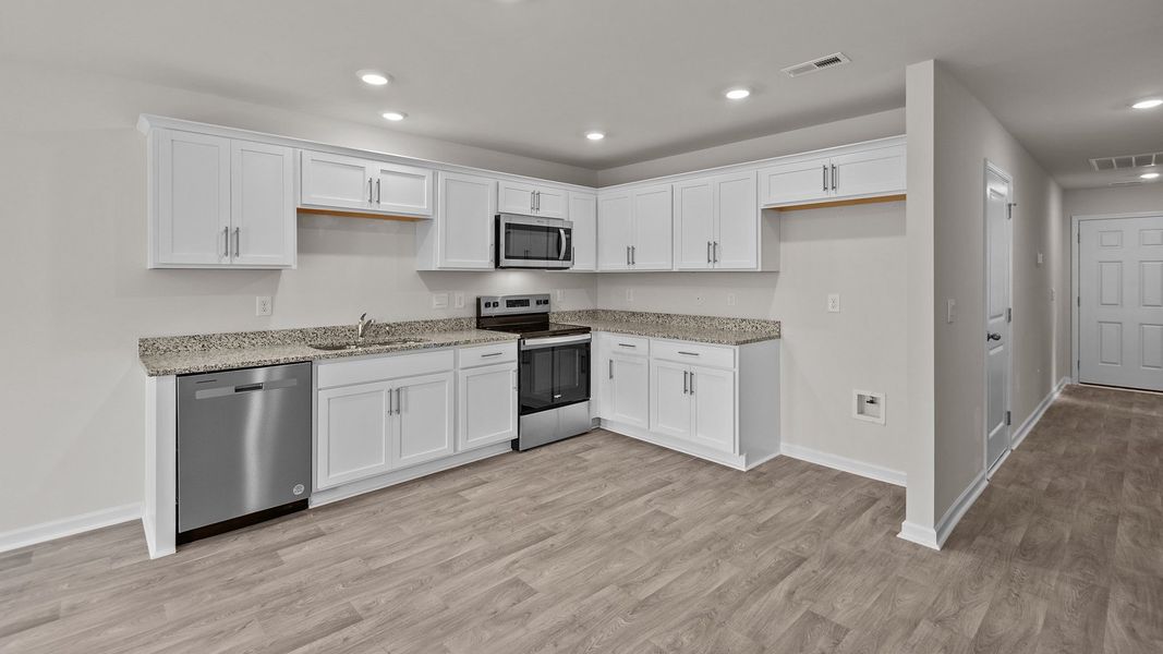 Furnished interior view inside a new home in Hobbs Farm, Ayden (Image 5).