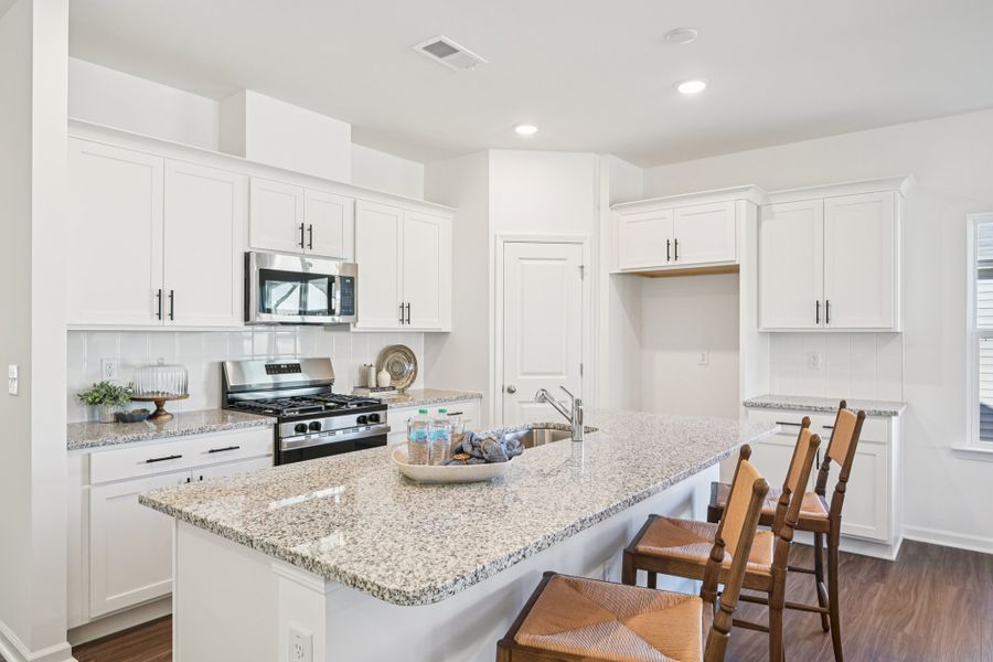 Representative furnished interior of a home built from the Caswell II by Ashton Woods in Crescent Mills, Wilson's Mills (Image 6). Representative furnished interior of a home built from the Caswell II by Ashton Woods in Crescent Mills, Wilson's Mills (Image 6).