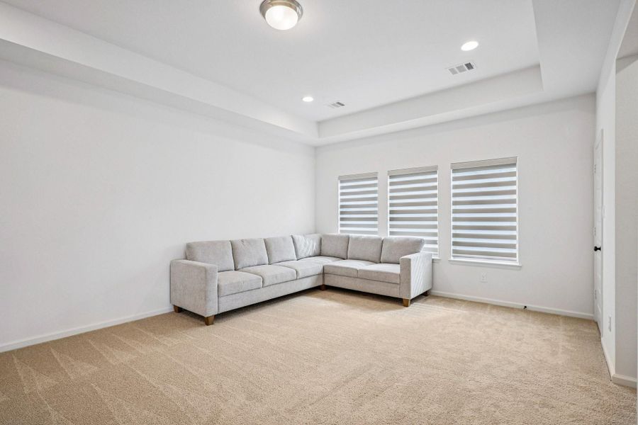 Furnished interior view inside a new home in Sienna, Missouri City (Image 17).