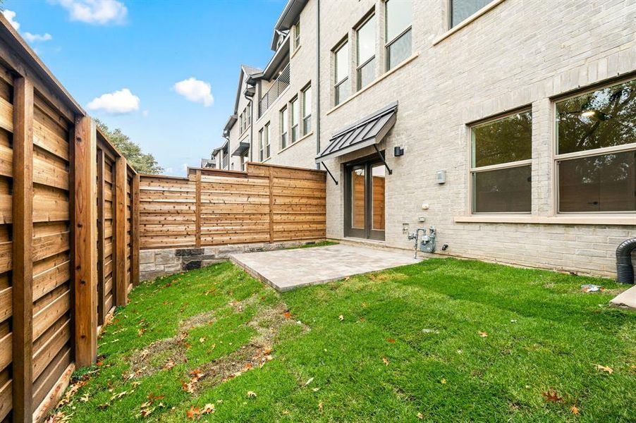 The private, fenced back yard located just off the main floor flex room offers the perfect space to enjoy some relaxing outdoor time. The private, fenced back yard located just off the main floor flex room offers the perfect space to enjoy some relaxing outdoor time.