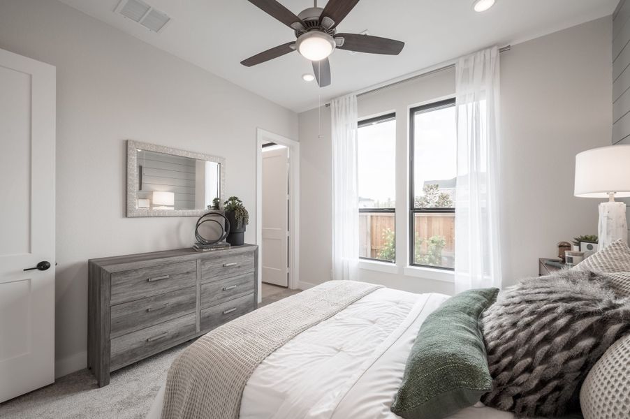 Representative furnished interior of a home built from the Carignan by Tri Pointe Homes in Dunham Pointe, Cypress (Image 39).