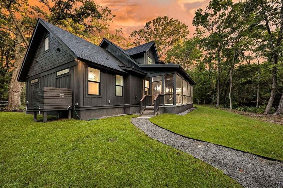 Exterior details and patio area of a home in , Johns Island (Image 29).