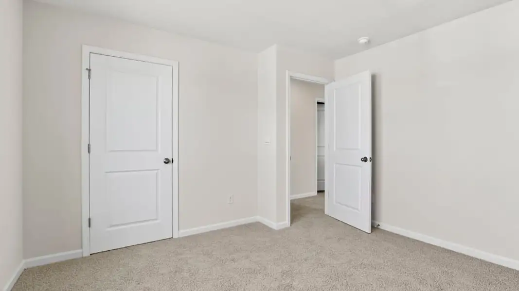 Spacious, unfurnished interior of a new home in Durbin Meadows Traditions, Fountain Inn (Image 25).