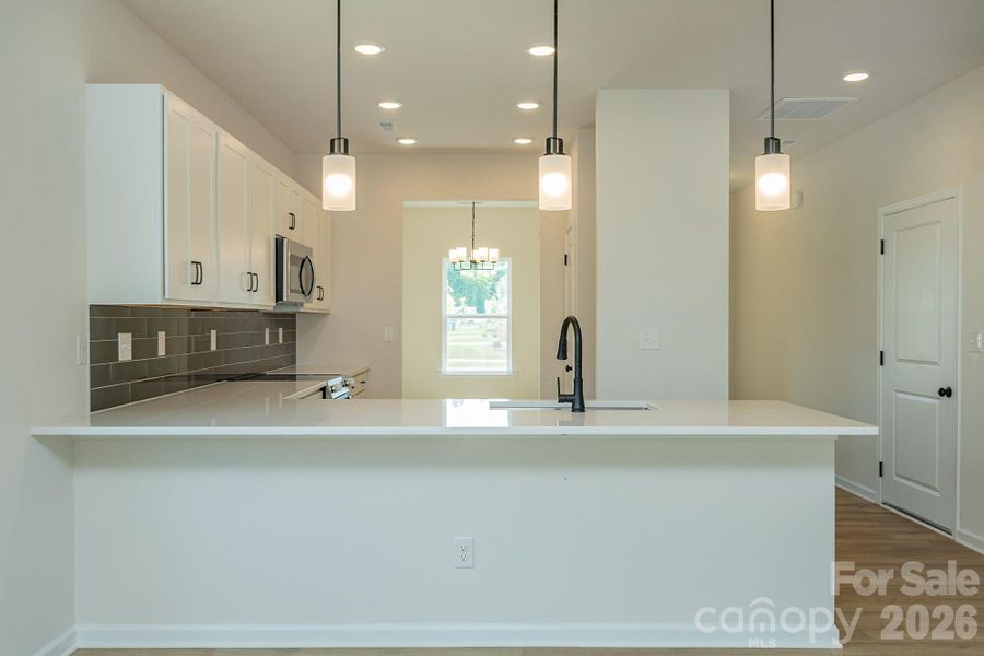 Furnished interior view inside a new home in Country Club Village, Salisbury (Image 10).