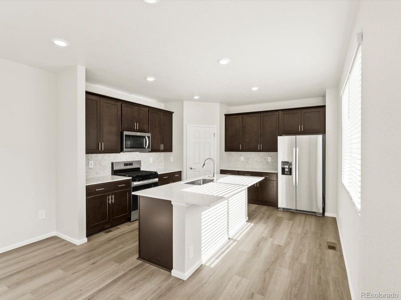 Furnished interior view inside a new home in Poudre Heights: The Lakes Collection, Windsor (Image 9).