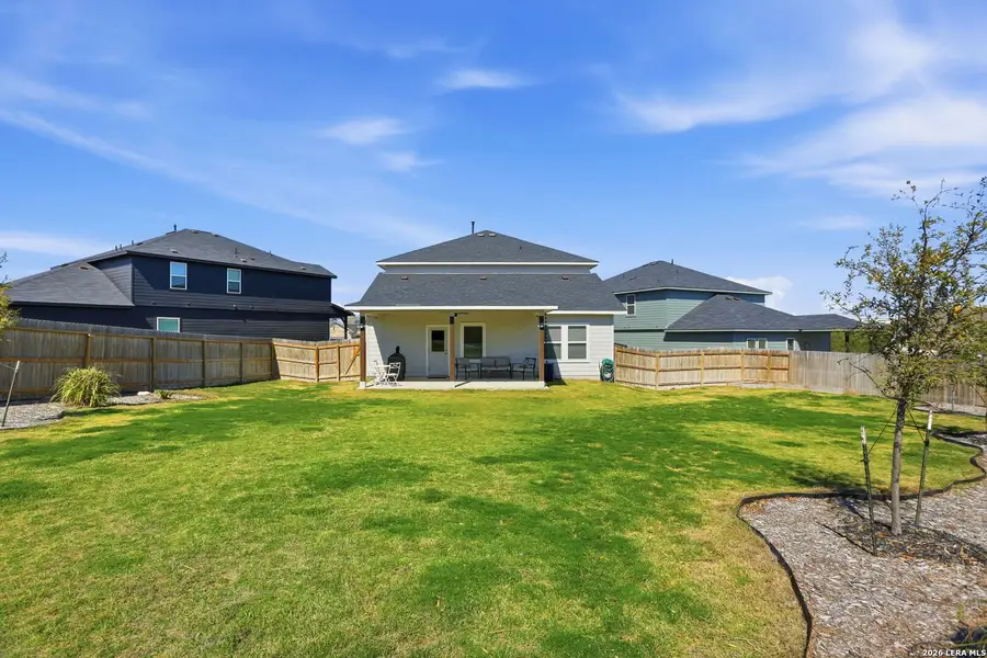 Exterior details and patio area of a home in Hunter's Ranch, San Antonio (Image 3).