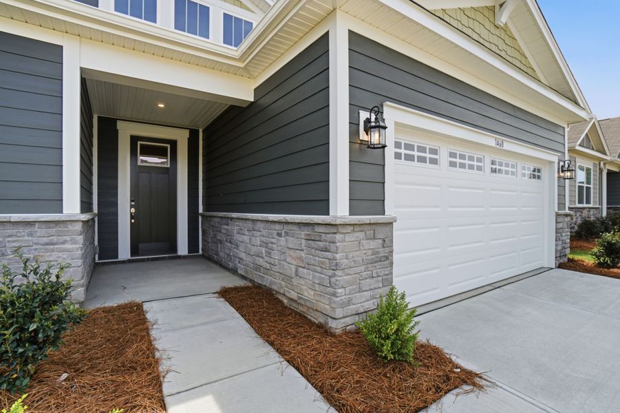 Exterior details and patio area of a home in Waxhaw Landing, Monroe (Image 3).