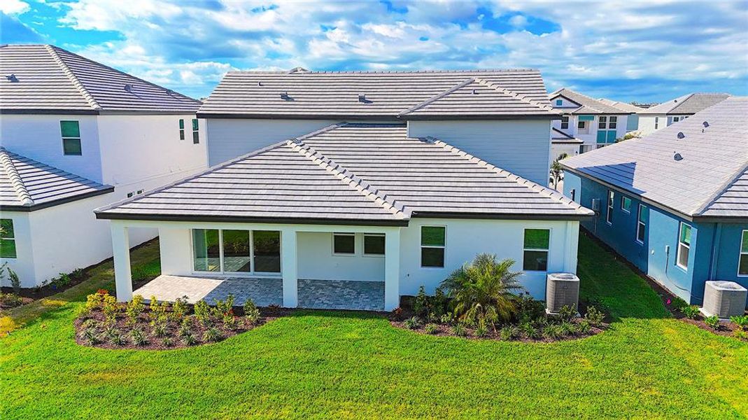 Exterior details and patio area of a home in Hawkstone, Sarasota (Image 29).