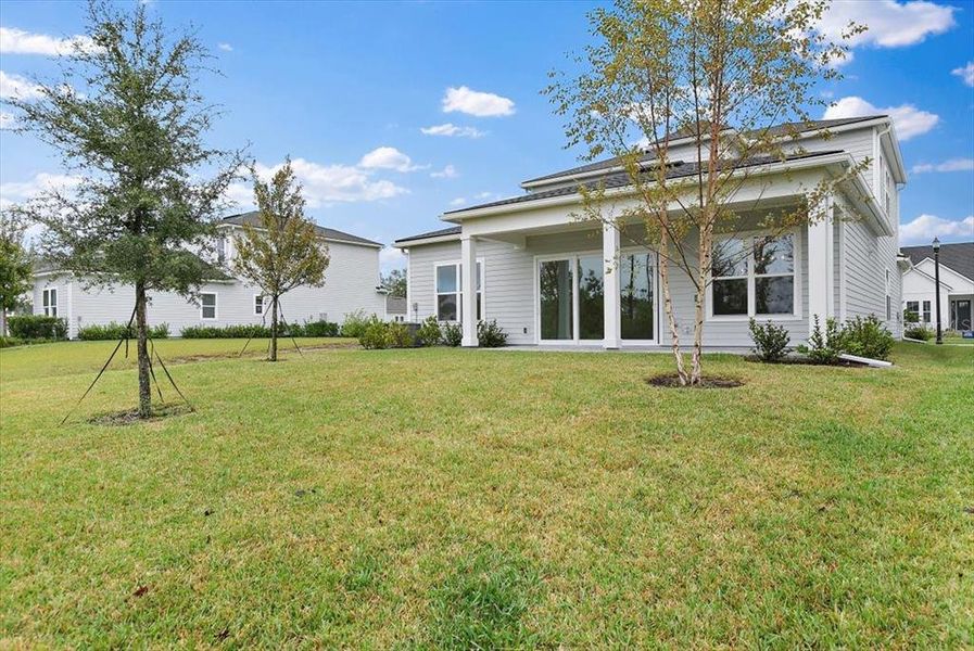 Exterior details and patio area of a home in , Palm Coast (Image 1).