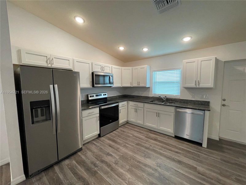 Furnished interior view inside a new home in , Labelle (Image 3).