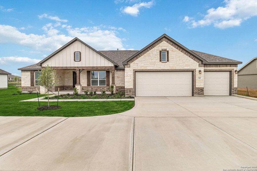 Front exterior of a new home in Lonesome Dove, San Antonio, TX, highlighting curb appeal (Image 24). Front exterior of a new home in Lonesome Dove, San Antonio, TX, highlighting curb appeal (Image 24).