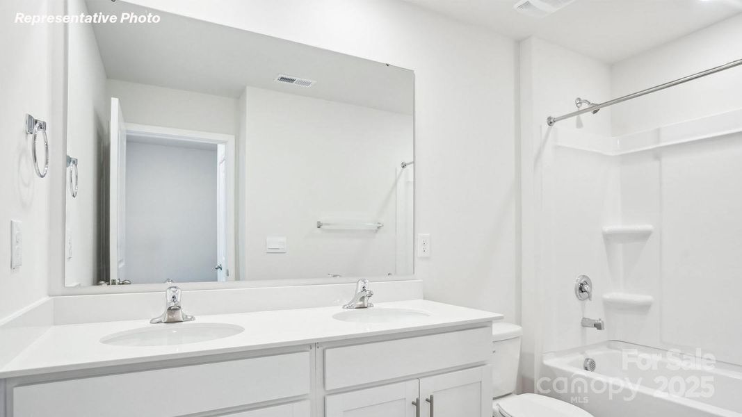 Furnished interior view inside a new home in Reedy Creek Preserve, Charlotte (Image 8).