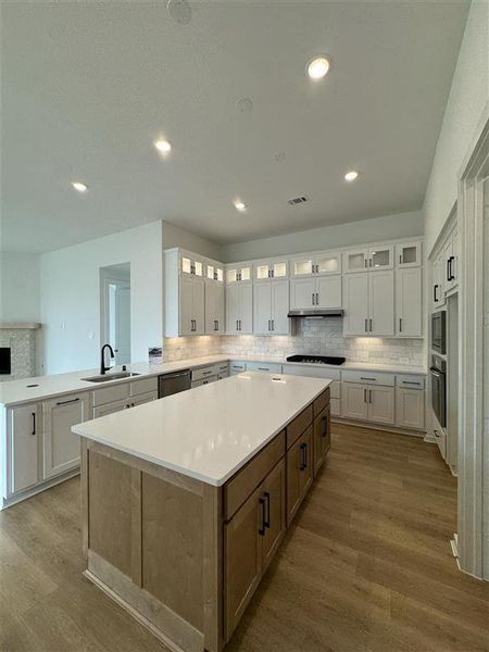 Kitchen with upgraded stacked upper cabinets and under counter lighting!