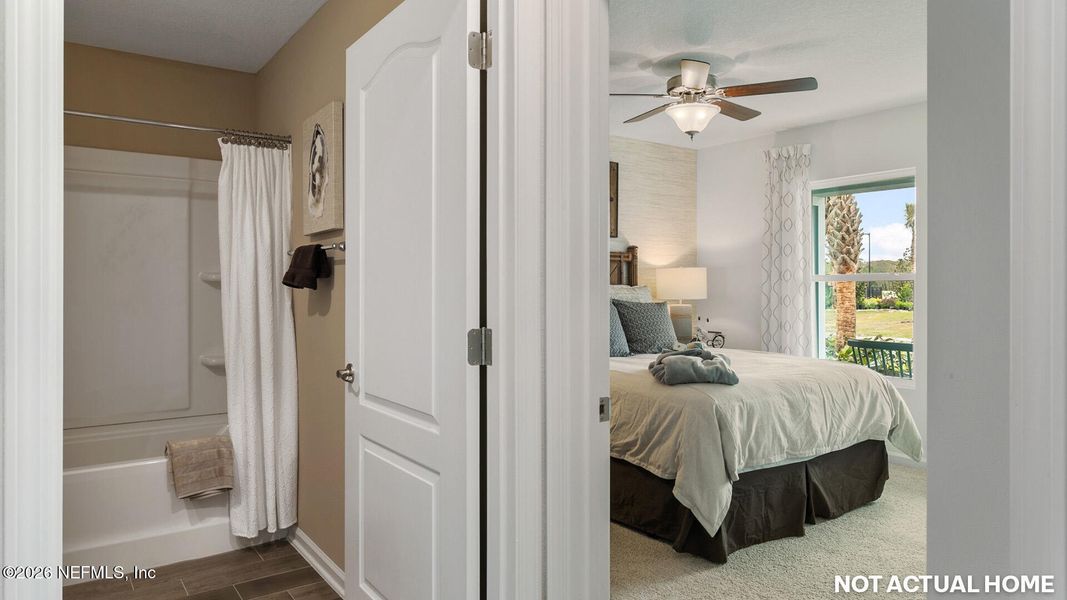 Furnished interior view inside a new home in Sawmill Branch, Palm Coast (Image 18).