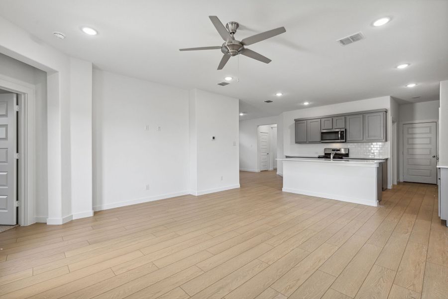 Living Room in the Oak II home plan by Trophy Signature Homes – REPRESENTATIVE PHOTO