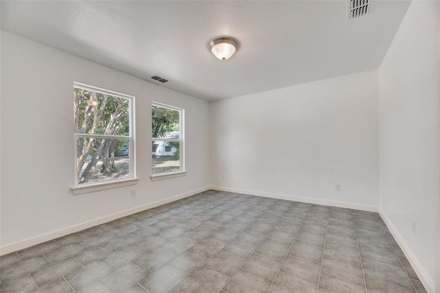 View of tiled spare room