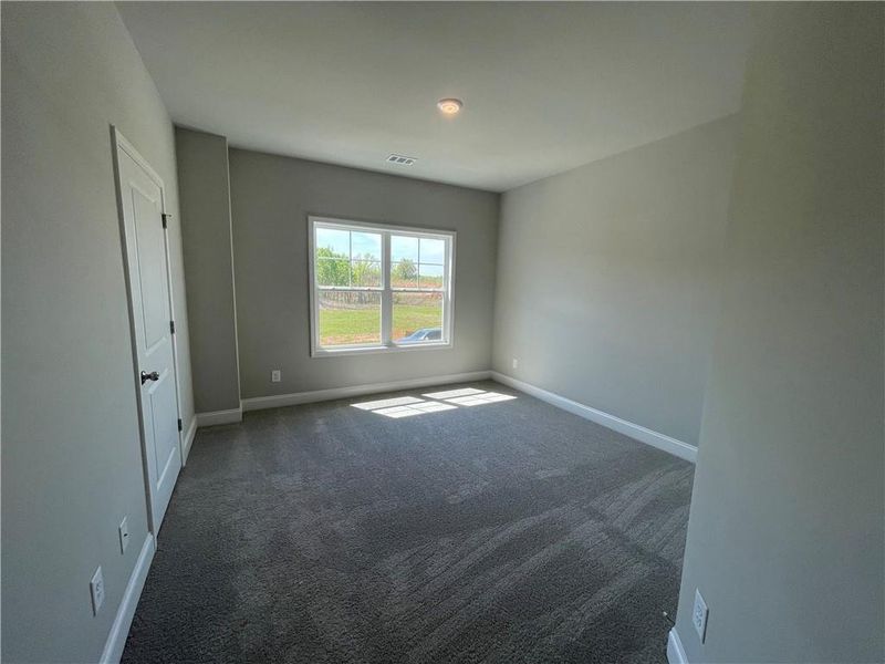 Spacious, unfurnished interior of a new home in Hidden Fields, Hoschton (Image 26). Spacious, unfurnished interior of a new home in Hidden Fields, Hoschton (Image 26).