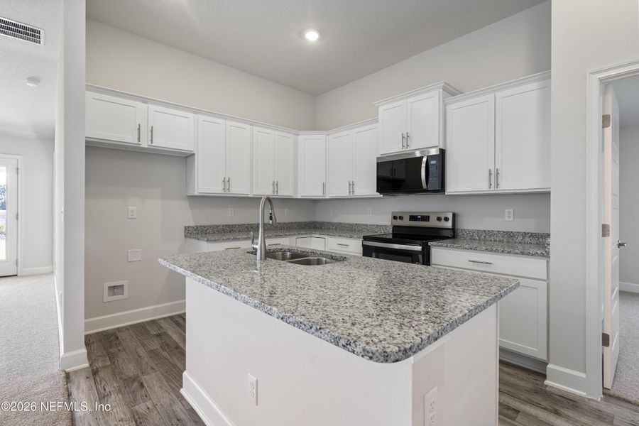 Furnished interior view inside a new home in Shadow Crest at Rolling Hills, Green Cove Springs (Image 10).