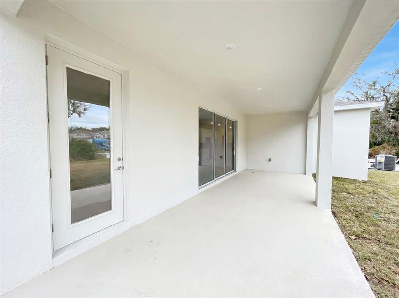 Exterior details and patio area of a home in Rivington, Debary (Image 2).
