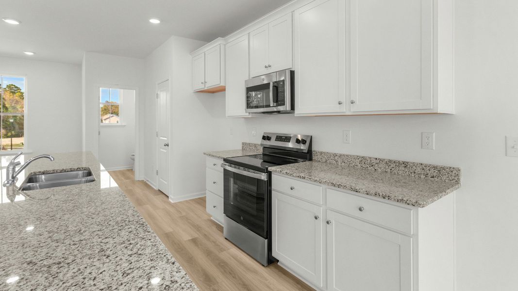 Furnished interior view inside a new home in Seabreeze Crossing, Little River (Image 11).