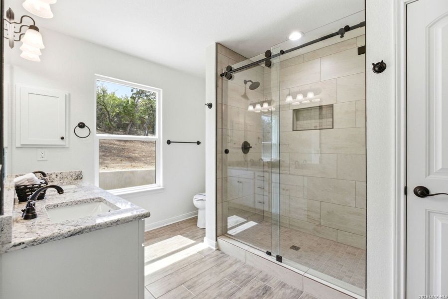 Furnished interior view inside a new home in , Fischer (Image 12).