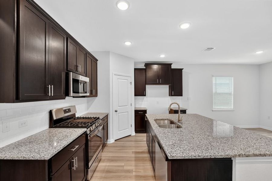 Furnished interior view inside a new home in Lisso, Pflugerville (Image 7).