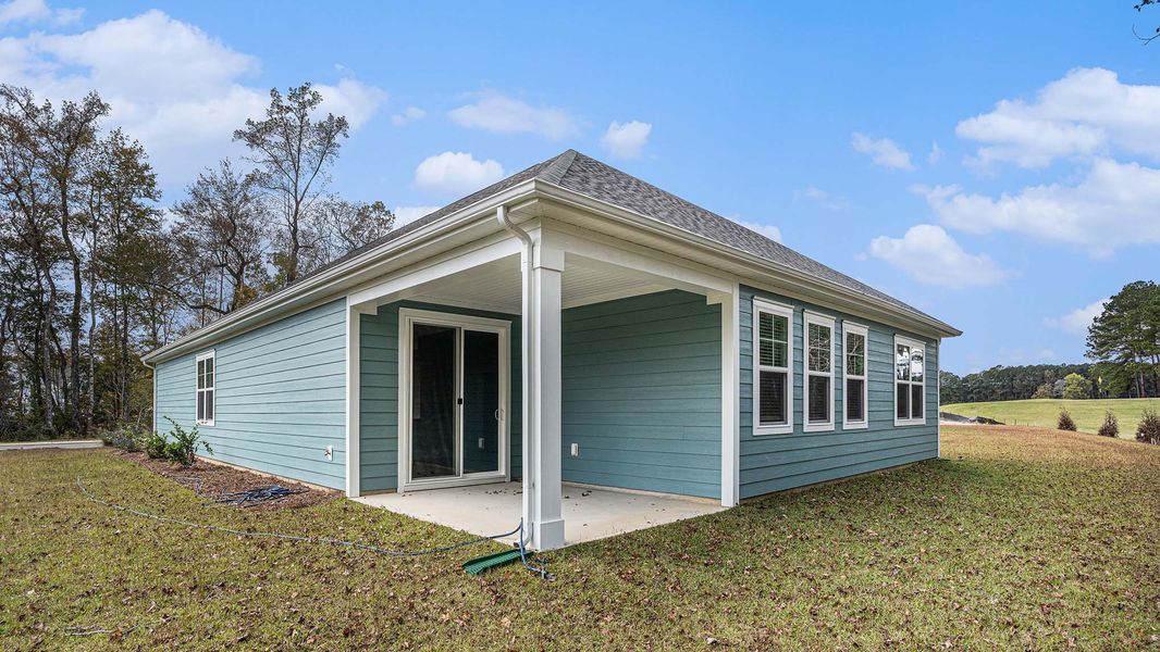 Exterior details and patio area of a home in The Bluffs at Mill Creek, Florence (Image 3). Exterior details and patio area of a home in The Bluffs at Mill Creek, Florence (Image 3).