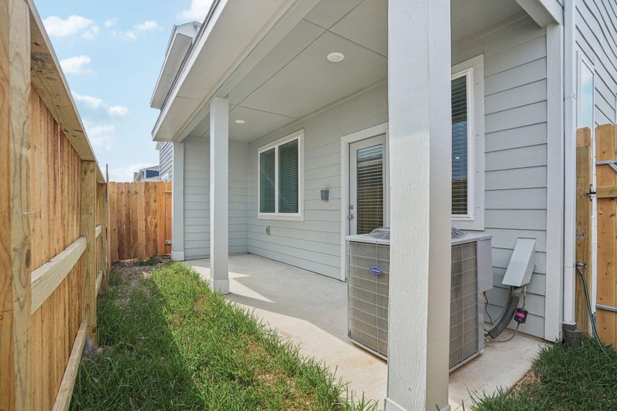 Exterior details and patio area of a home in Kemah Crossing - City Series, Kemah (Image 23). Exterior details and patio area of a home in Kemah Crossing - City Series, Kemah (Image 23).