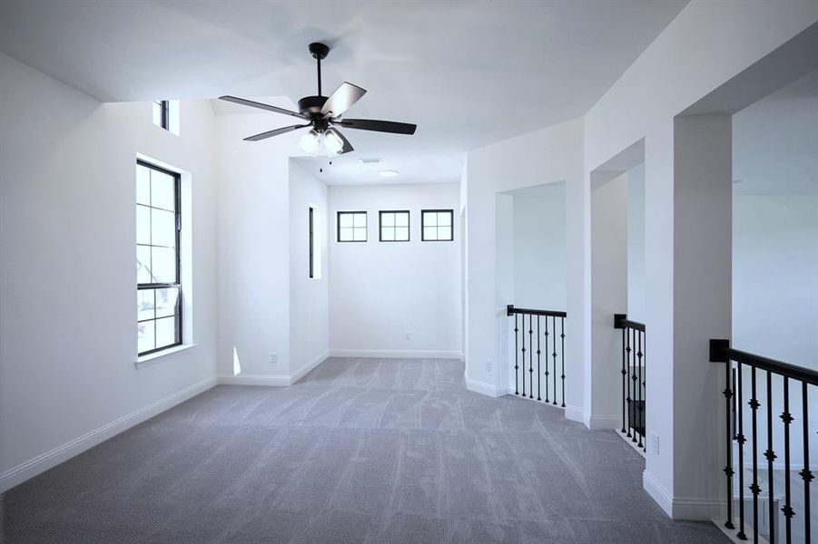 Upstairs Game Room overlooking the Kitchen and Living Room