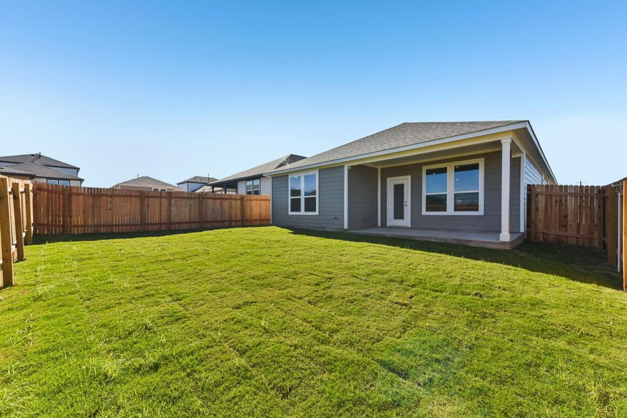 Exterior details and patio area of a home in The Glen at Stallion Run, Buda (Image 24).