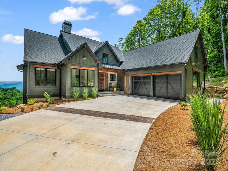 Front exterior of a new home in , Mill Spring, NC, highlighting curb appeal (Image 20).