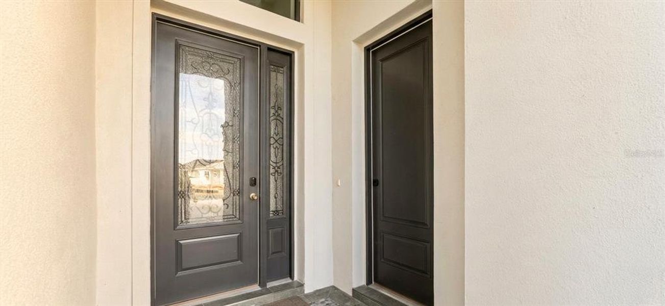 Exterior details and patio area of a home in , Auburndale (Image 3).
