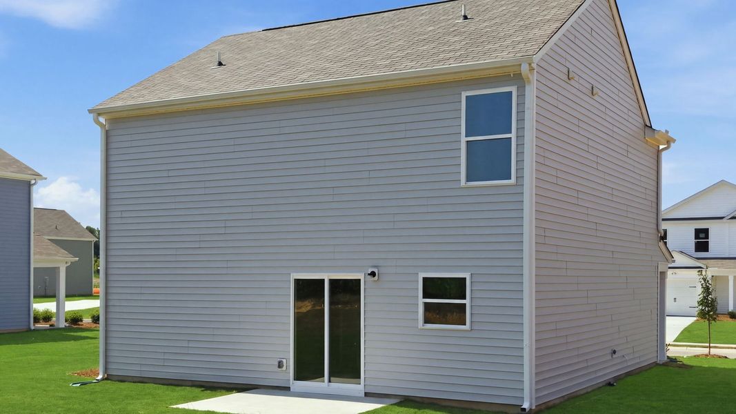 Exterior details and patio area of a home in Hobbs Farm, Ayden (Image 4).