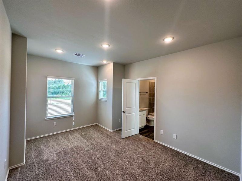 Bedroom 2 features a sitting nook & a walk in closet