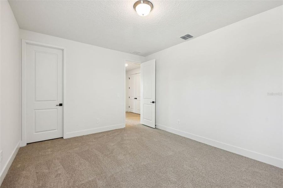 Spacious, unfurnished interior of a new home in Ridgehaven - Signature Series, Ormond Beach (Image 49).