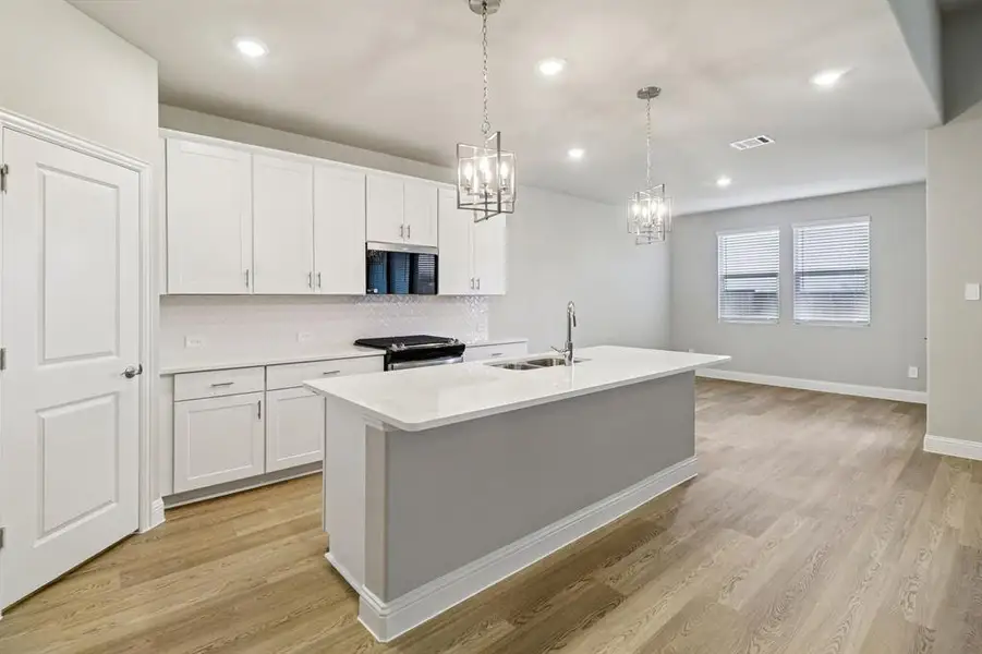 Furnished interior view inside a new home in Lakehaven - Premier Series, Farmersville (Image 7).