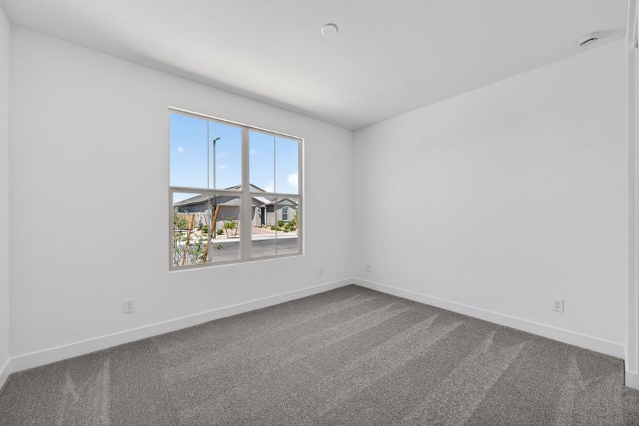 Spacious, unfurnished interior of a new home in Artisan at Asante, Surprise (Image 18).