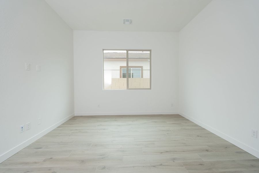 Spacious, unfurnished interior of a new home in Waterston Central, Gilbert (Image 16).