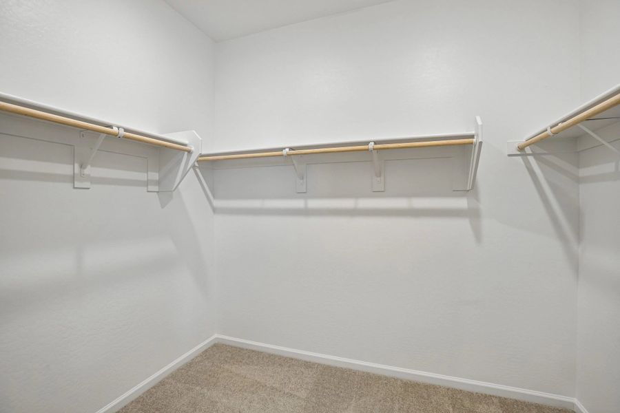 Primary walk in closet Primary walk in closet