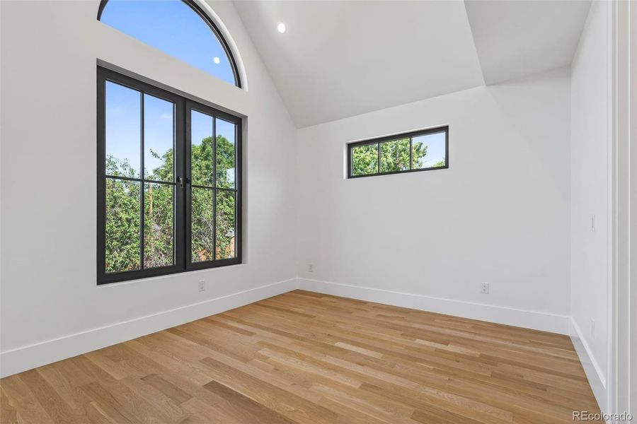 Each secondary bedroom with vaulted ceilings and ensuite bath