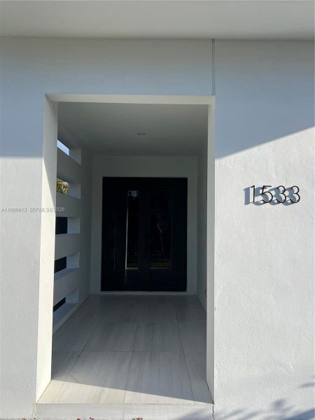 Exterior details and patio area of a home in , Miami (Image 18). Exterior details and patio area of a home in , Miami (Image 18).