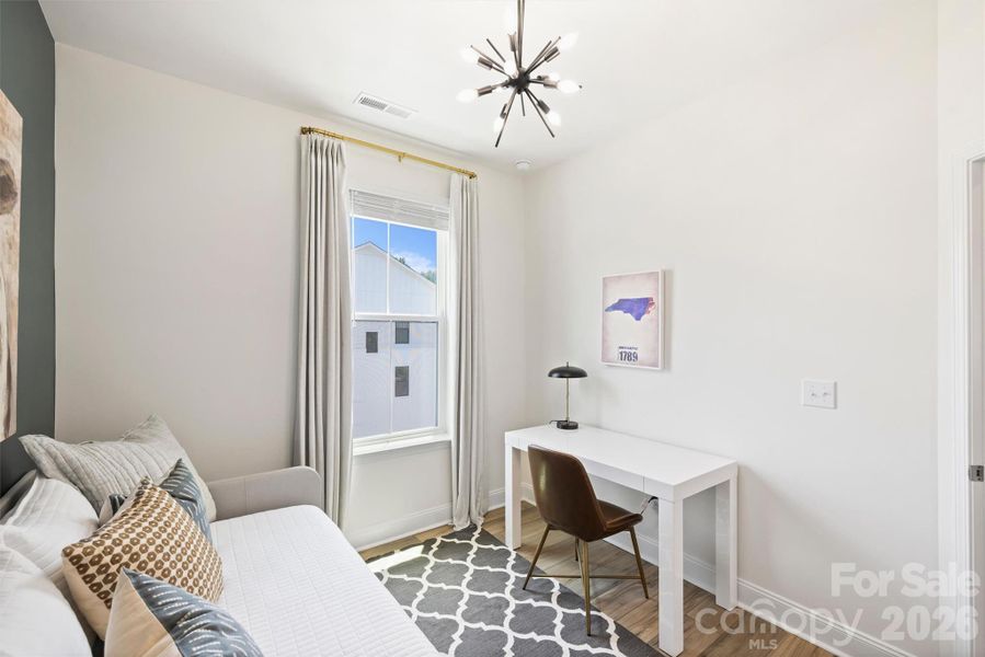 Furnished interior view inside a new home in The Townes of Cotswold, Charlotte (Image 34).