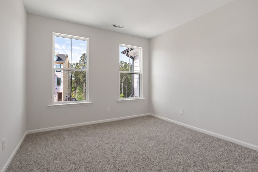 Spacious, unfurnished interior of a new home in Sweetbrier, Durham (Image 25).