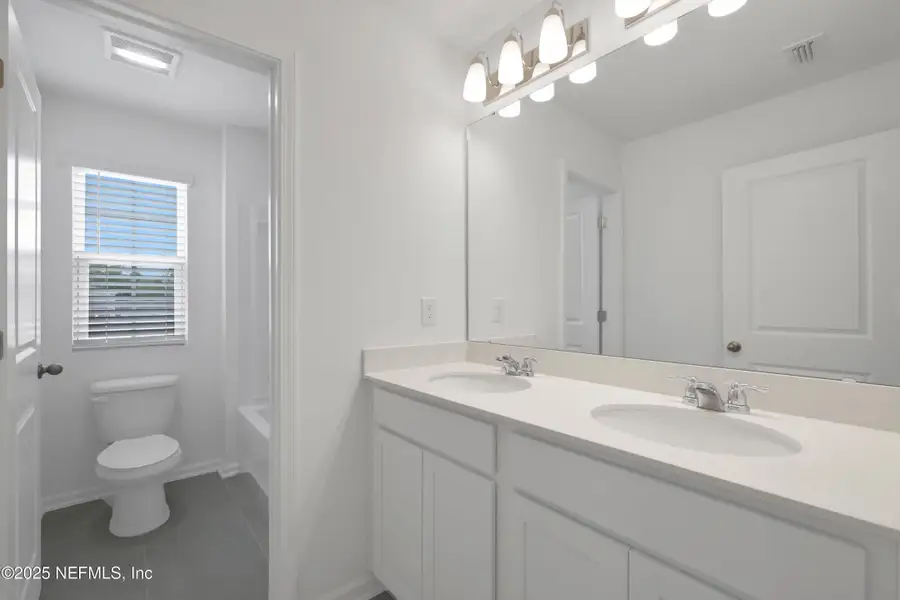 Furnished interior view inside a new home in Cordova Palms, St. Augustine (Image 9).