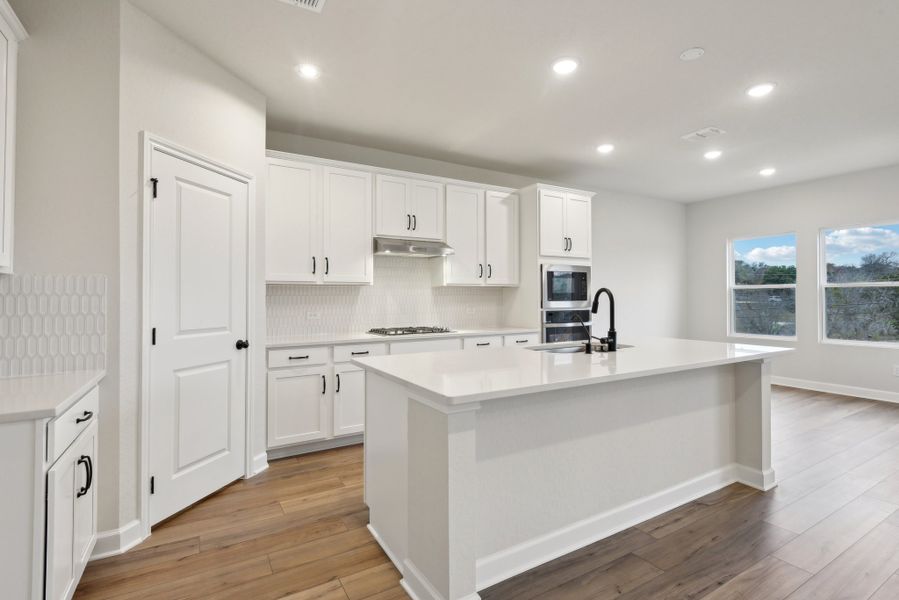 Representative furnished interior of a home built from the Makenzie by Ashton Woods in Hennersby Hollow, San Antonio (Image 5).