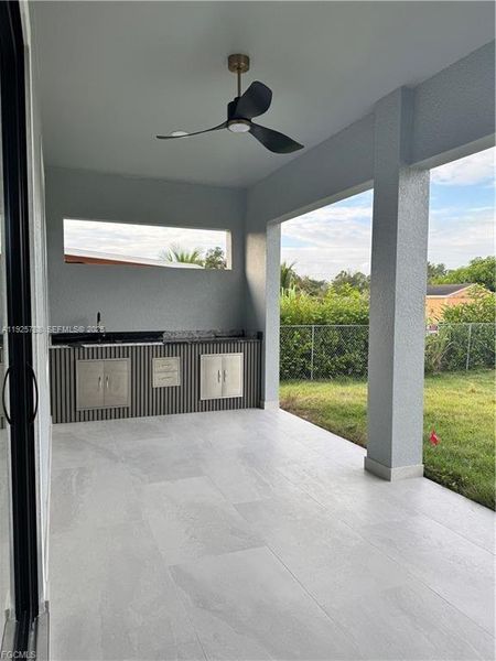 Exterior details and patio area of a home in , Lehigh Acres (Image 16). Exterior details and patio area of a home in , Lehigh Acres (Image 16).