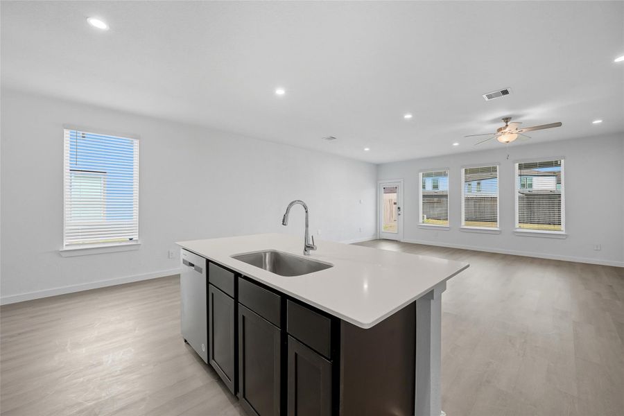 The windows and the extended space between your neighbor helps accent the wonderful amount of natural light that comes through the home.